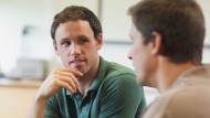 Two men talking