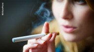 Woman using an e-cigarette