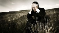 Businessman in field