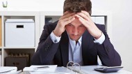 man stressed at work