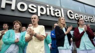 Nurses at the hospital in Madrid, where nurse Teresa Romero was infected with Ebola, protest at spending cuts. REX/ZUMA