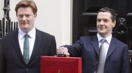 Danny Alexander and George Osborne ahead of today's Budget. Photo: Jonathan Hordle/REX