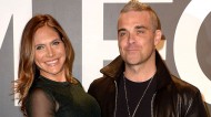 Robbie Williams and wife Ayda Field will "strenuously" defend sexual harassment claims. Photo: Stewart Cook/REX