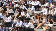 What is the maximum workplace temperature? City workers head outside to enjoy the sunshine. Photo: REX