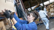 While many work voluntarily, charities will see a hike in the paybill next April when the national living wage is introduced.