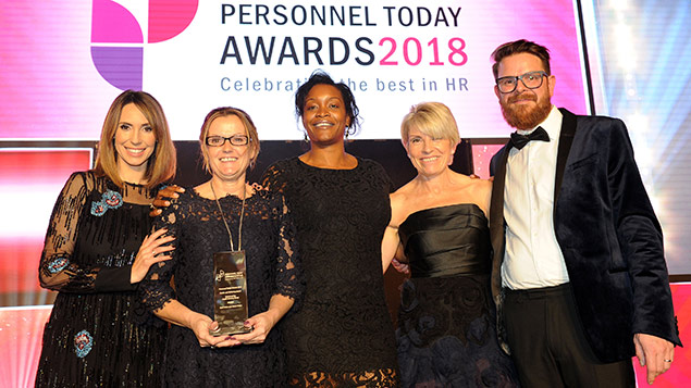 Kent Police and Essex Police team members pick up their Health and Wellbeing award from Lloyds Bank's Michelle Blaney (second from right).