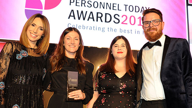Members of the Secret Intelligence team, flanked by Alex Jones and Personnel Today editor Rob Moss collect their Innovation in Recruitment Award at the Personnel Today Awards 2018
