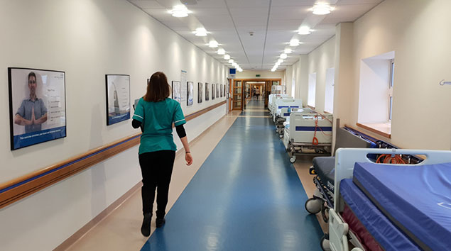 NHS hospital corridor and nurse