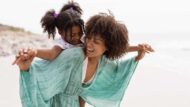 mother and child on beach