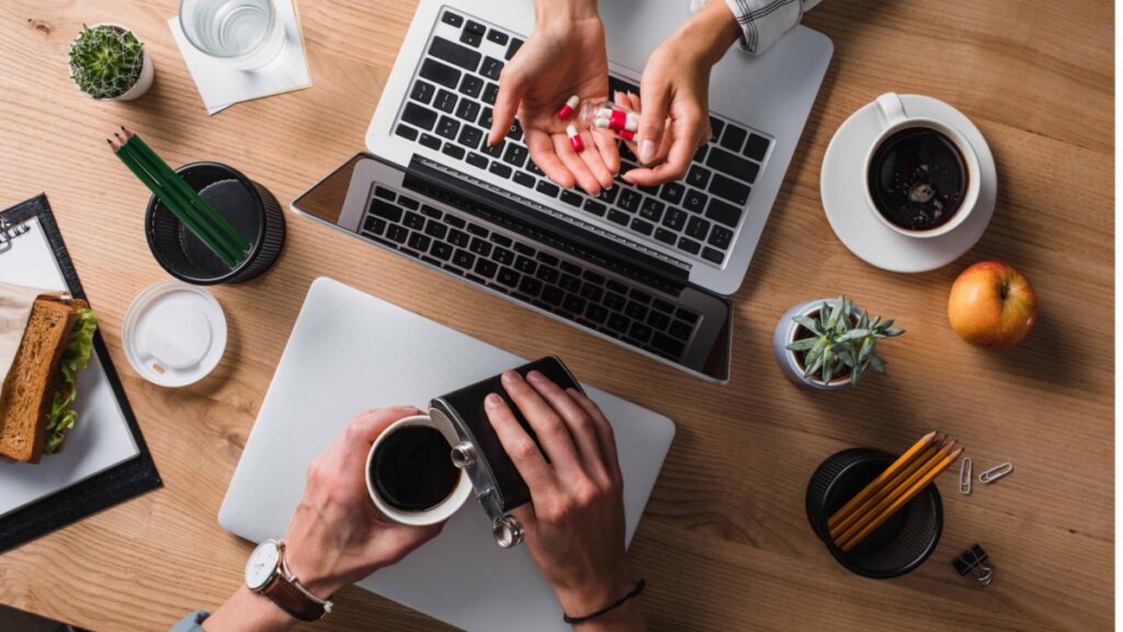 Drug and alcohol misuse at an employee's desk