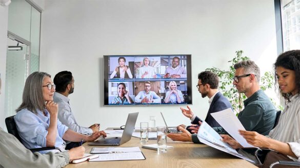 HR professionals having a virtual meeting in a boardroom
