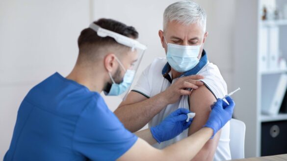 A man being vaccination against Covid-19