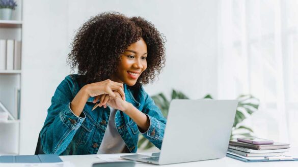 Woman looking at a laptop