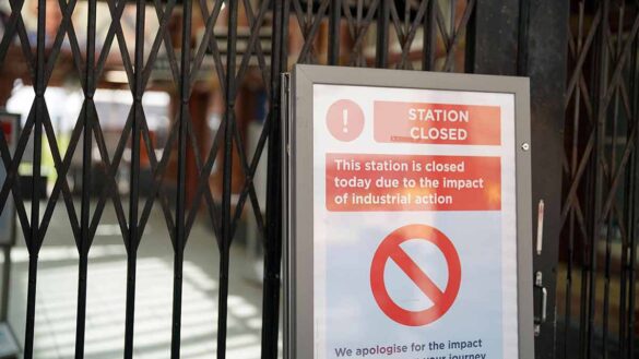 Who is on strike and when? Picture of rail station gates closed during industrial action.