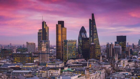The sun setting over the city of London