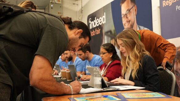 Refugees at a job fair in London October 2023