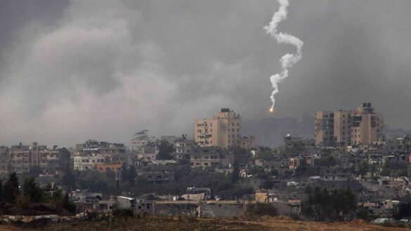 HR strategies in crisis situations: photo shows a flare lighting up the sky during fighting in northern Gaza.