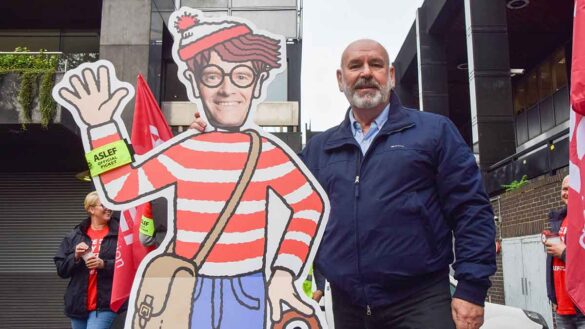 Aslef rail strikes 2024: Aslef general secretary Mick Whelan stands next to a cardboard cutout of transport secretary Mark Harper depicted as 'Where's Wally?' Photo: Vuk Valcic/SOPA/ZUMA/Alamy