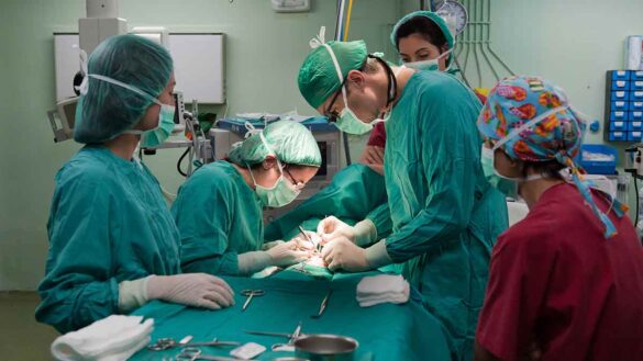 Doctors strike January 2024: surgeons performing an operation.