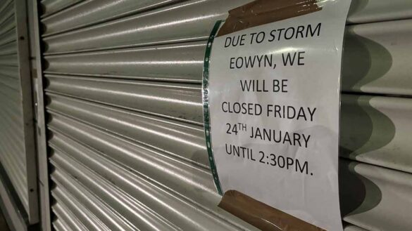 Storm Eowyn severe weather employers. Photo shows a shuttered up shop with a closure notice because of Storm Eowyn