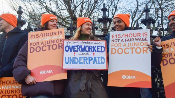 Junior doctors on strike, holding placards