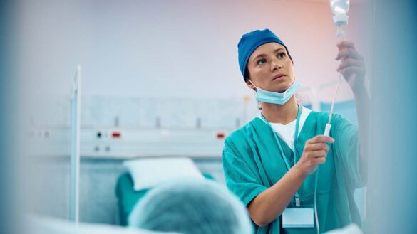 A health worker on a hospital ward.