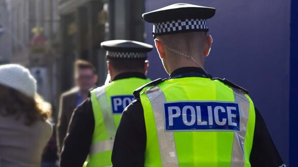 Two police officers on duty on the street