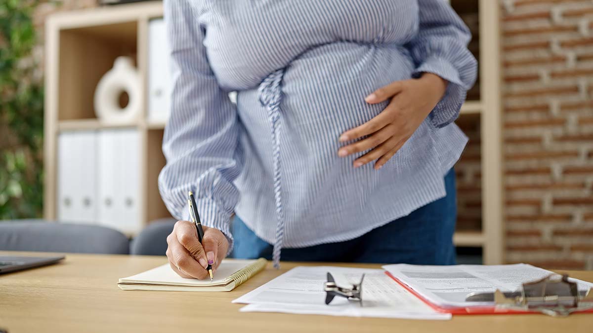 A pregnant woman at work