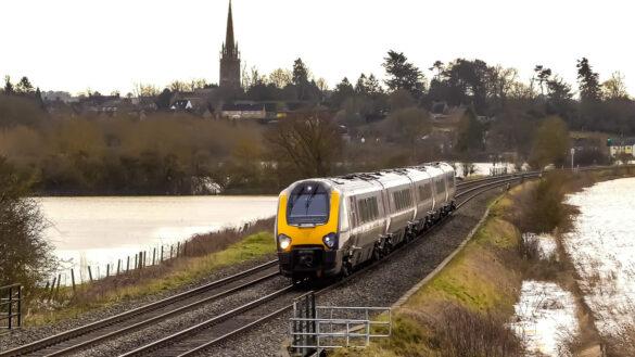 Train passing over flooded fields