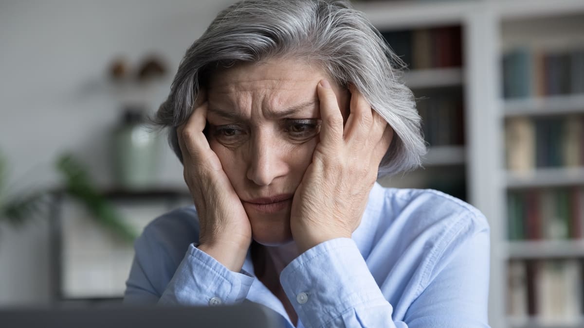 Older woman looking worried