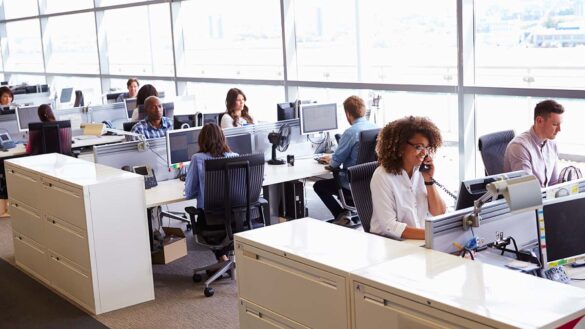 Staff in a busy open-plan office