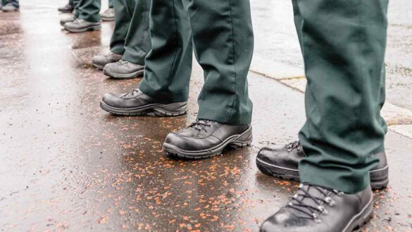 PSNI data breach provisional fine: photo shows a number of uniformed officers' boots.