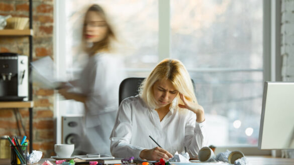 Two women in office