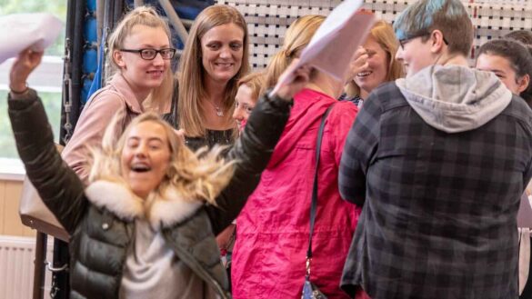 Happy A-level results students in UK