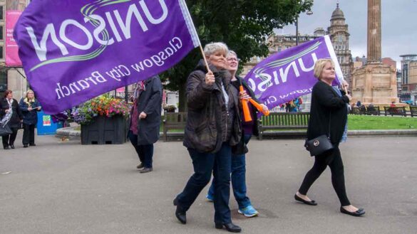 Scotland council workers strike ballot. Image shows Unison members on a protest in Glasgow.