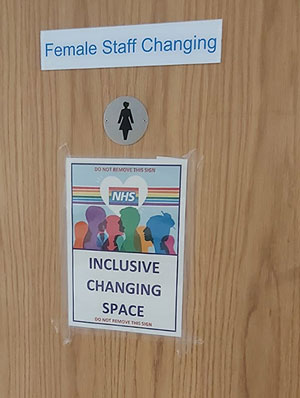 Sign reading "Inclusive" on the female changing room.