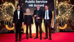 Healthdaq collect the Excellence in Public Service HR prize for their work at the Department of Health Northern Ireland at the Personnel Today Awards 2024