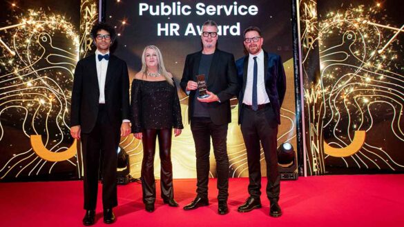 Healthdaq collect the Excellence in Public Service HR prize for their work at the Department of Health Northern Ireland at the Personnel Today Awards 2024