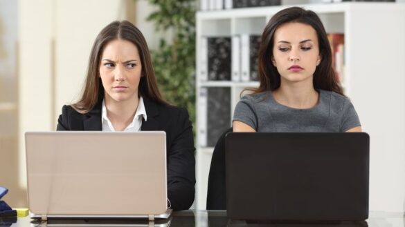 Women in office looking irritated