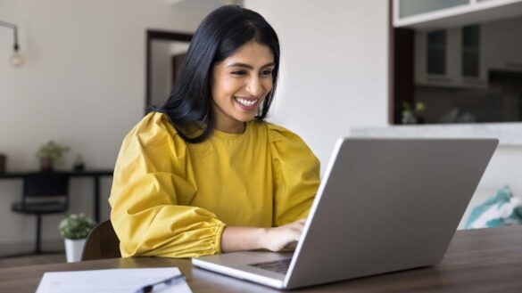 How to employ global workforce from the UK webinar. Photo shows an Asian woman on a video call