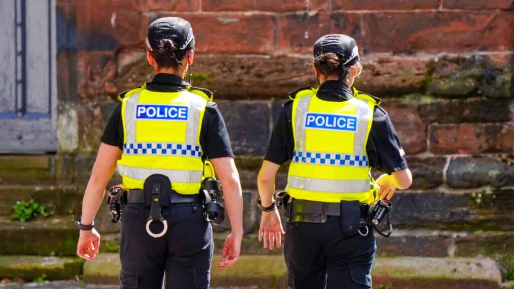 Police second jobs: Photo shows to female police officers on the beat