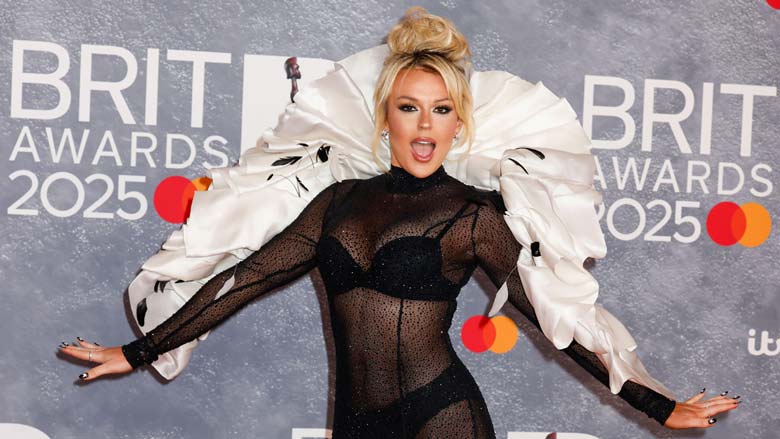 Tallia Storm posing at the Brit Awards 2025. She was happy to have her photo taken with the Police Scotland officer.