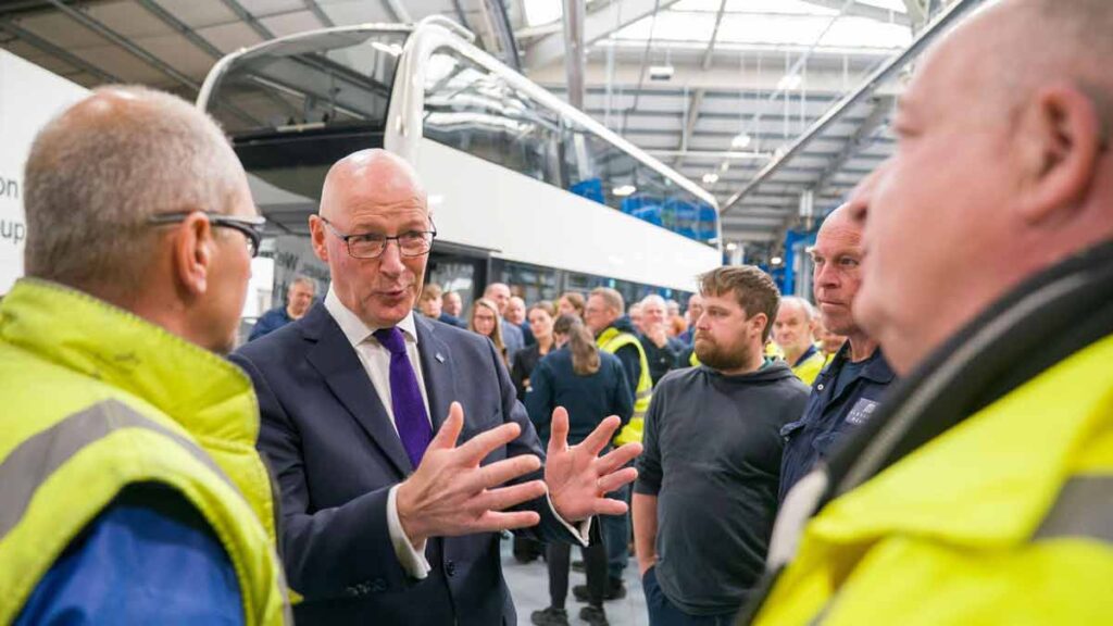 Furlough scheme at bus manufacturer in Scotland. Photo shows Scotland's First Minister John Swinney visiting Alexander Dennis.