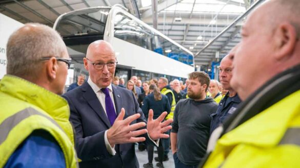 Furlough scheme at bus manufacturer in Scotland. Photo shows Scotland's First Minister John Swinney visiting Alexander Dennis.